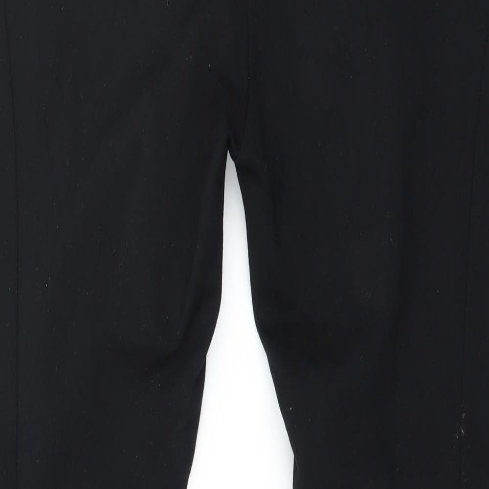 Brand and care label for Prime women’s black jersey capri leggings, size M, 28-inch leg