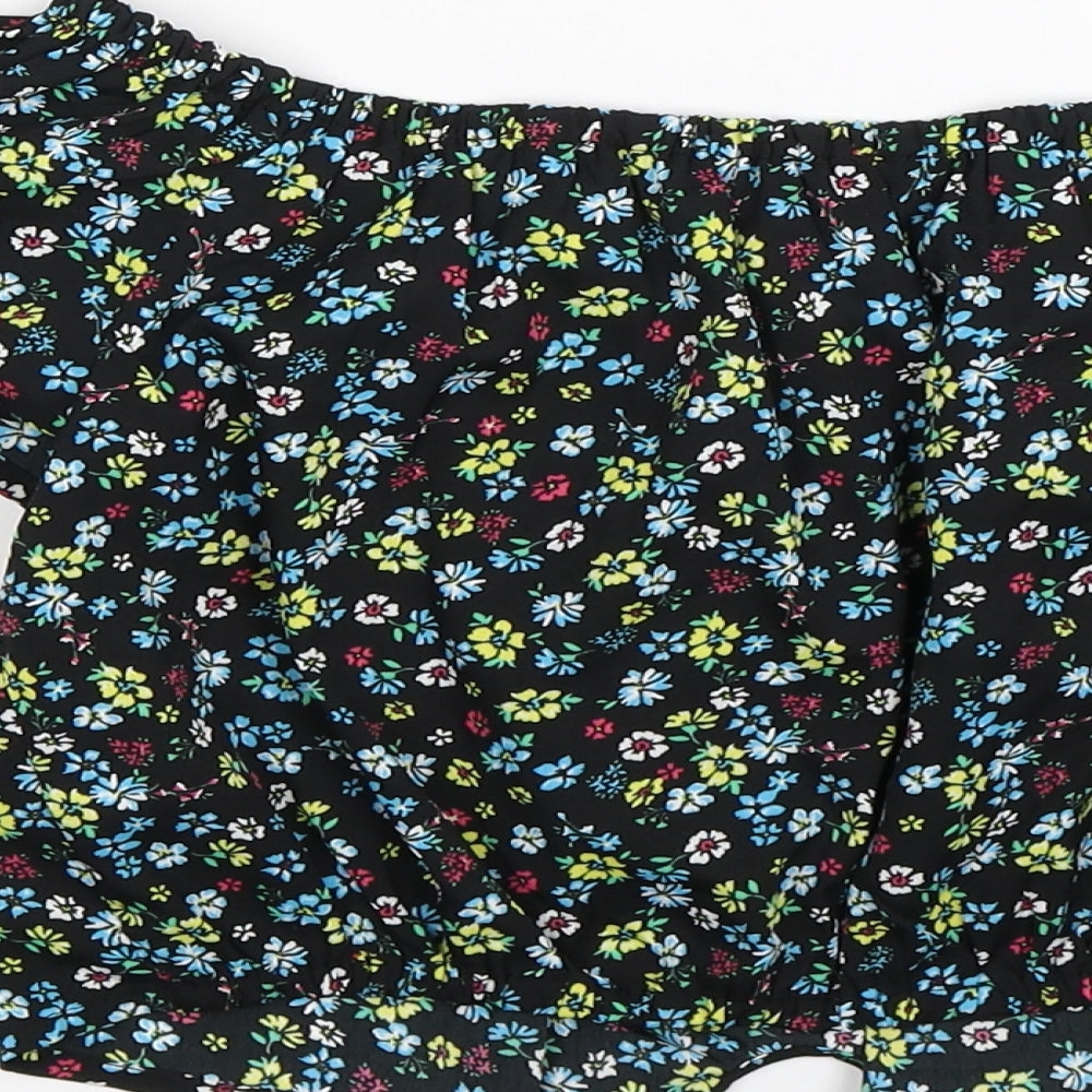 Brand and care label for New Look girls’ black floral satin cropped t-shirt, size 13, years