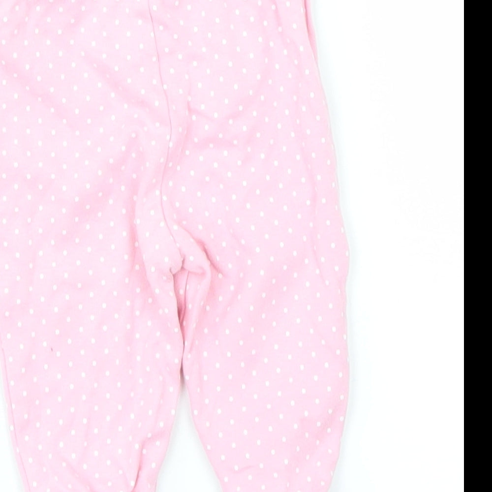 Brand and care label for George girls’ pink polka dot jogger leggings, size 0-3, months