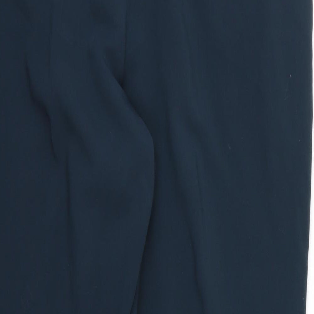 Brand and care label for Preworn women’s blue rayon trousers, size UK 38, in, 28-inch leg