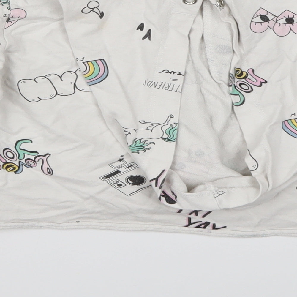 Brand and care label for H&M girls’ white pullover hoodie, size 11, years