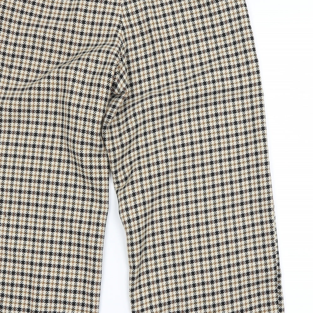 Brand and care label for H&M women’s beige trousers, size UK 10, 22-inch leg