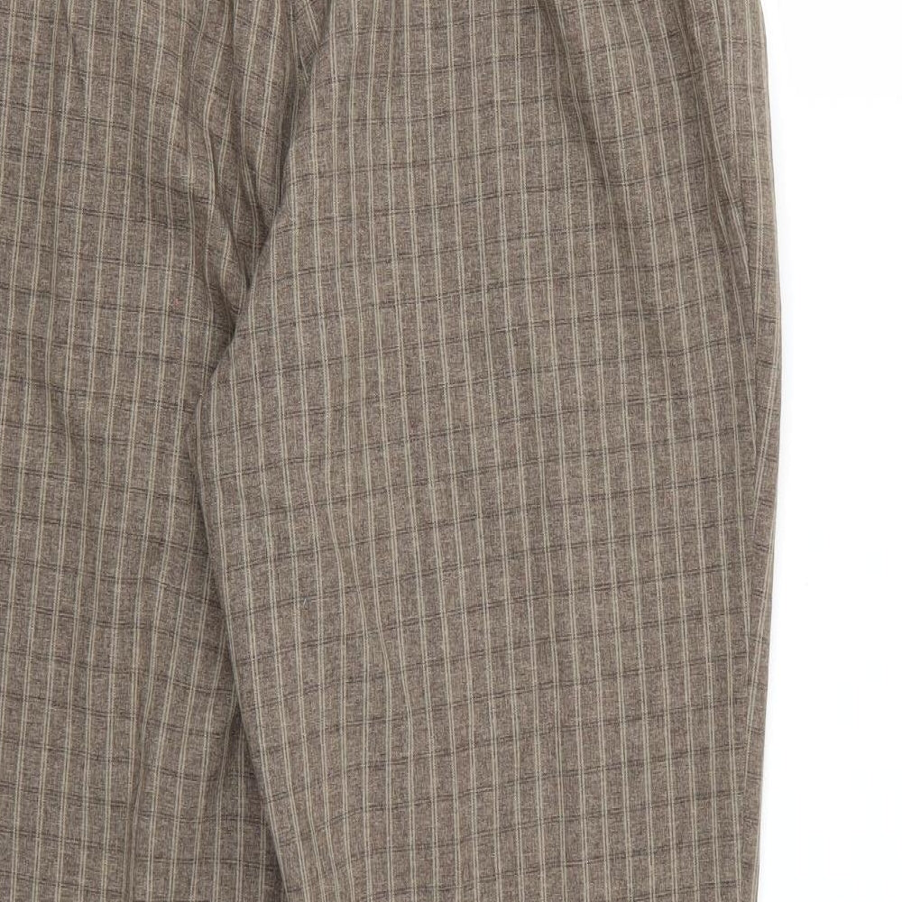 Brand and care label for Essentials Collection women’s brown check rayon trousers, size UK 16, 26-inch leg