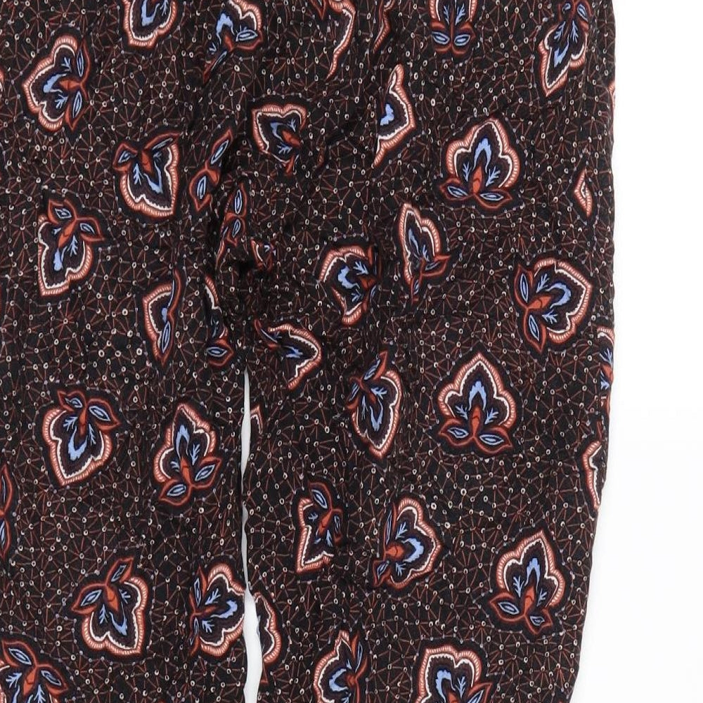 Brand and care label for H&M women’s brown floral bloomer trousers, size UK 4