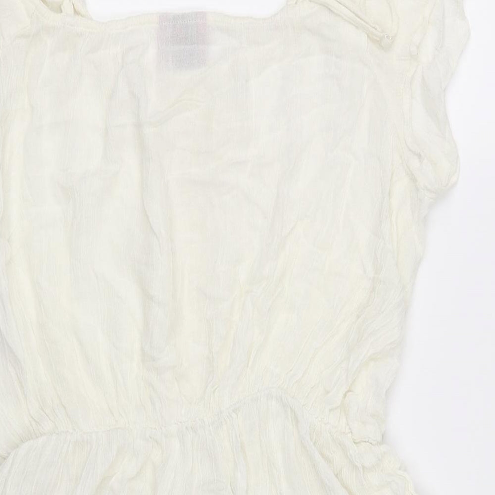 Brand and care label for Alive women’s white jumpsuit one-piece, size M