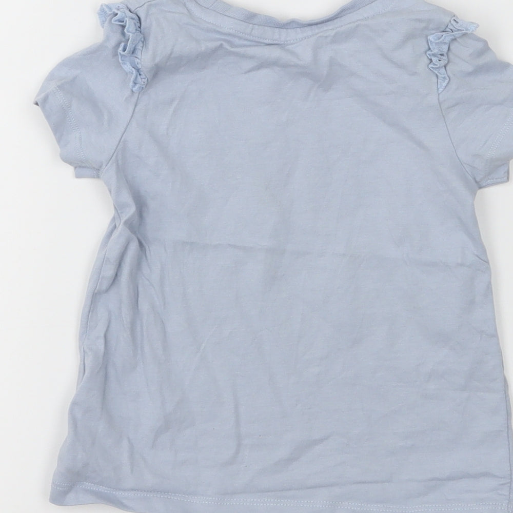 Brand and care label for Nutmeg girls’ blue jersey basic t-shirt, size 2-3, years