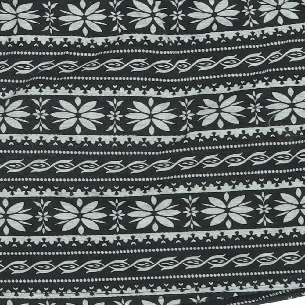 Brand and care label for Young Dimension girls’ black geometric mini skirt, size 9-10, years