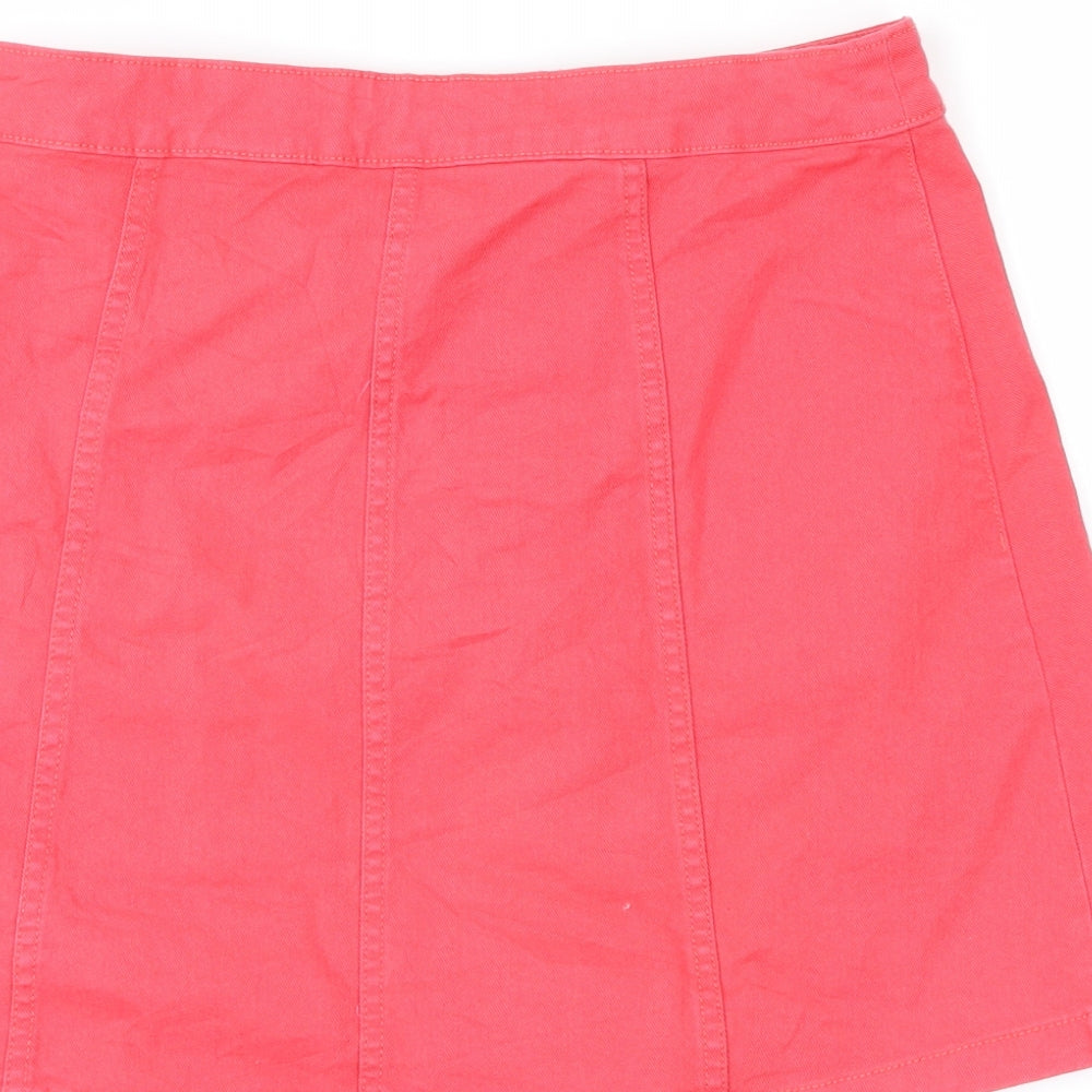 Brand and care label for H&M women’s red cargo skirt, size UK 6
