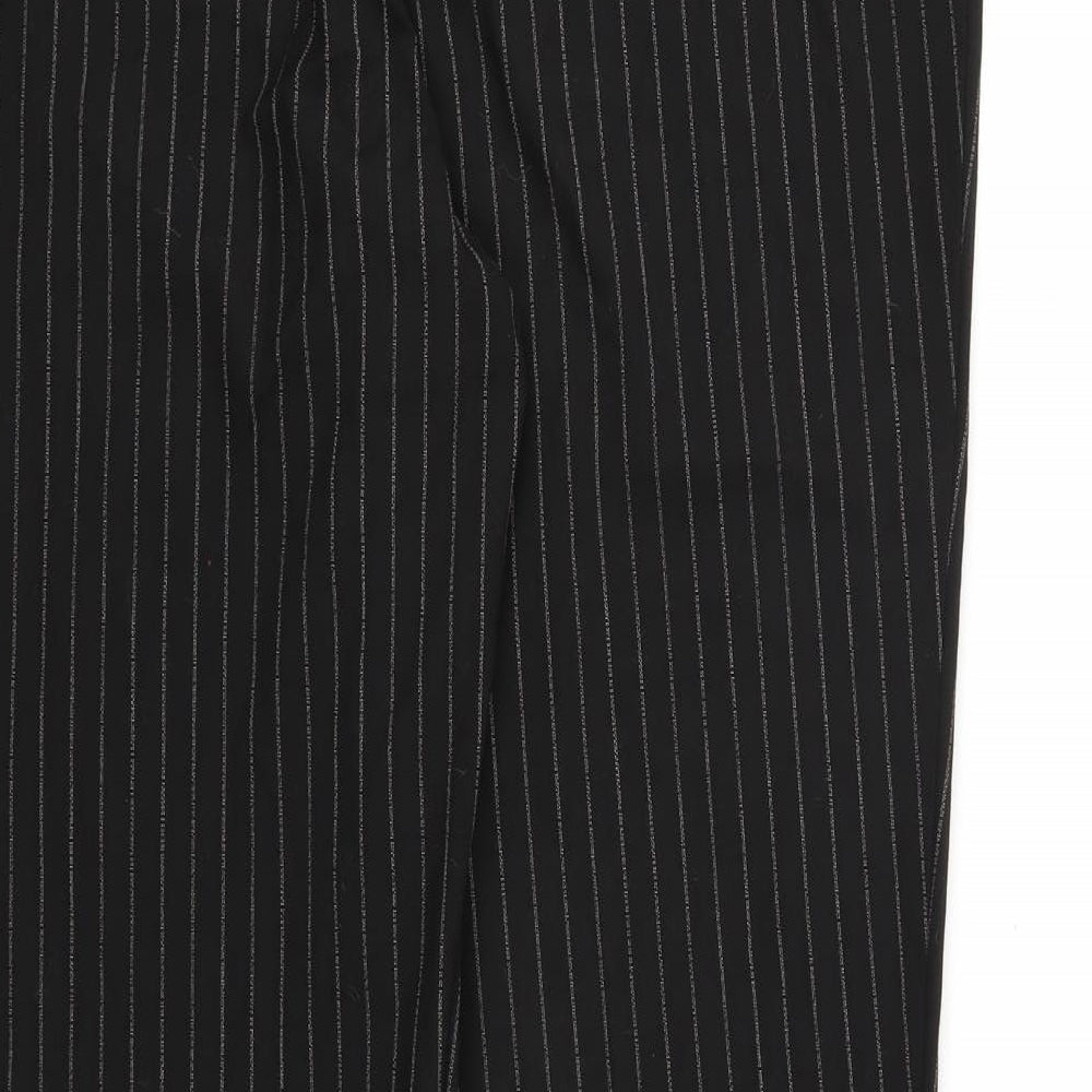 Brand and care label for Marks & Spencer women’s black striped trousers, size UK 16, 28-inch leg