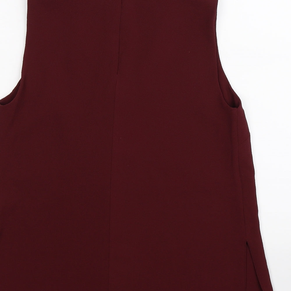 Brand and care label for New Look women’s purple tunic tank, size UK 8
