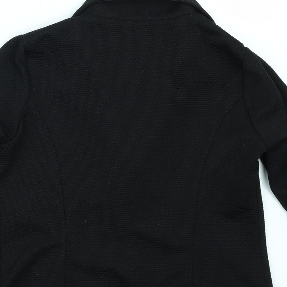 Brand and care label for Cosmic Kids girls’ black jacket, size 10, years