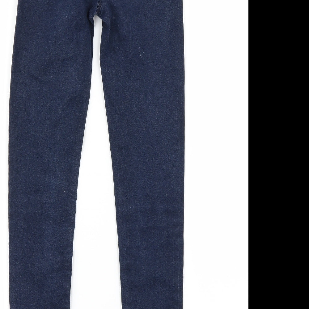 Brand and care label for Preworn girls’ blue skinny jeans, size 12, years