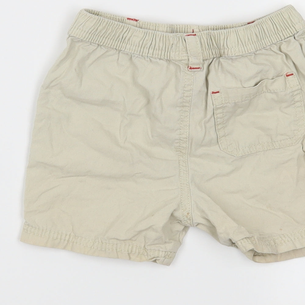 Brand and care label for M&Co boys’ beige cargo trousers, size 18-24, months