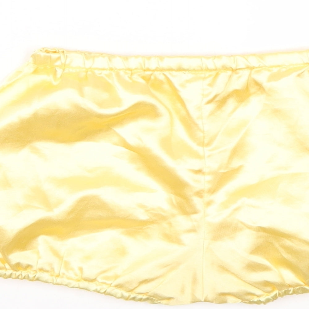 Brand and care label for Preworn boys’ yellow cropped trousers, size 12-18, months