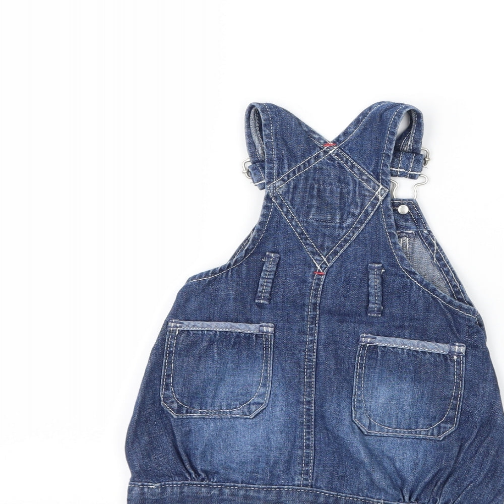 Brand and care label for Gap girls’ blue denim pinafore/dungaree dress, size 3-6, months
