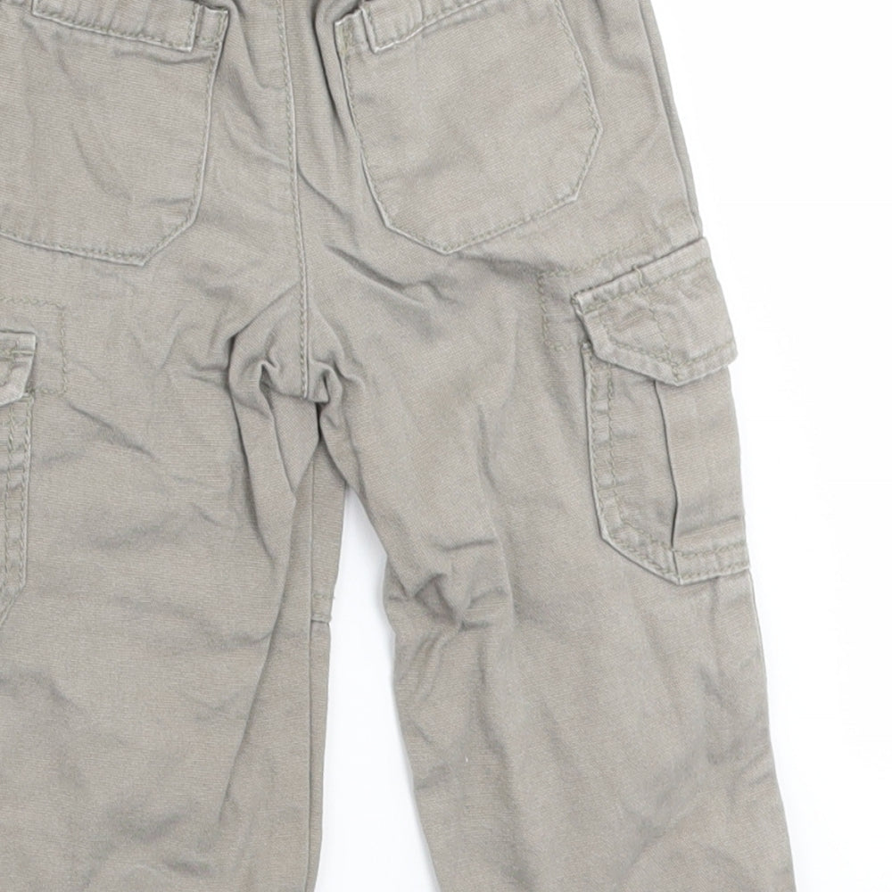Brand and care label for Cyrillus boys’ beige jogger jeans, size 18, months