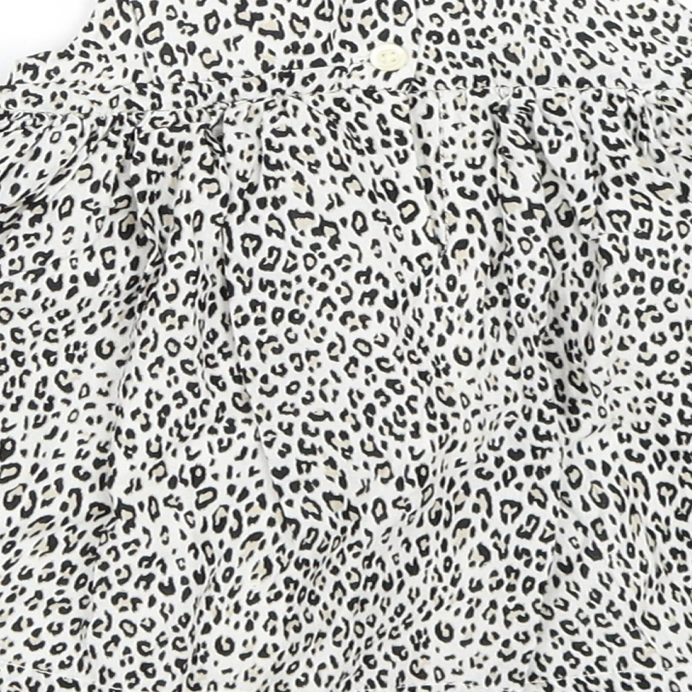 Brand and care label for Gap girls’ beige animal print skater dress, size 3-6, months - leopard print