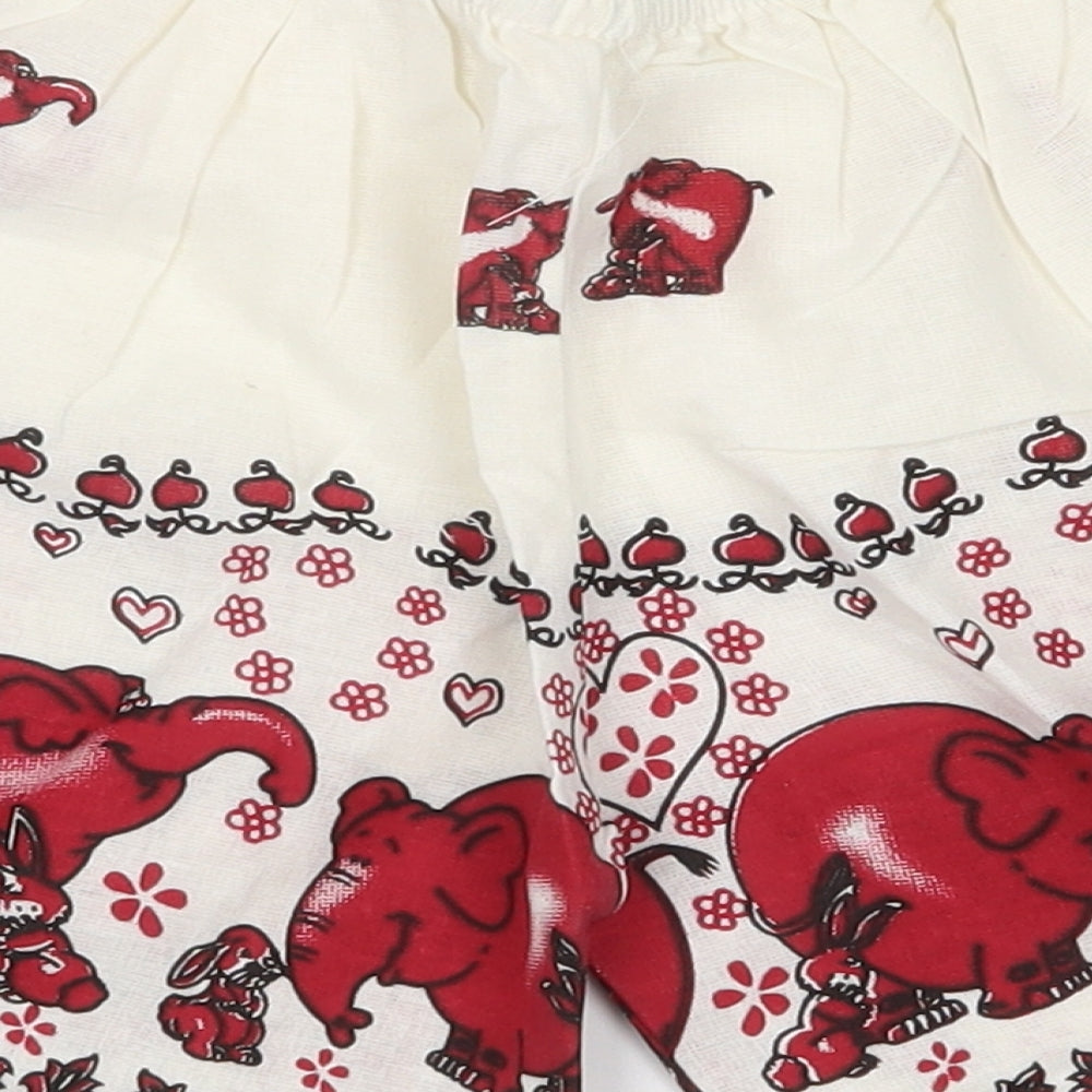 Brand and care label for Preworn boys’ white animal print cargo shorts, size 3-4, years