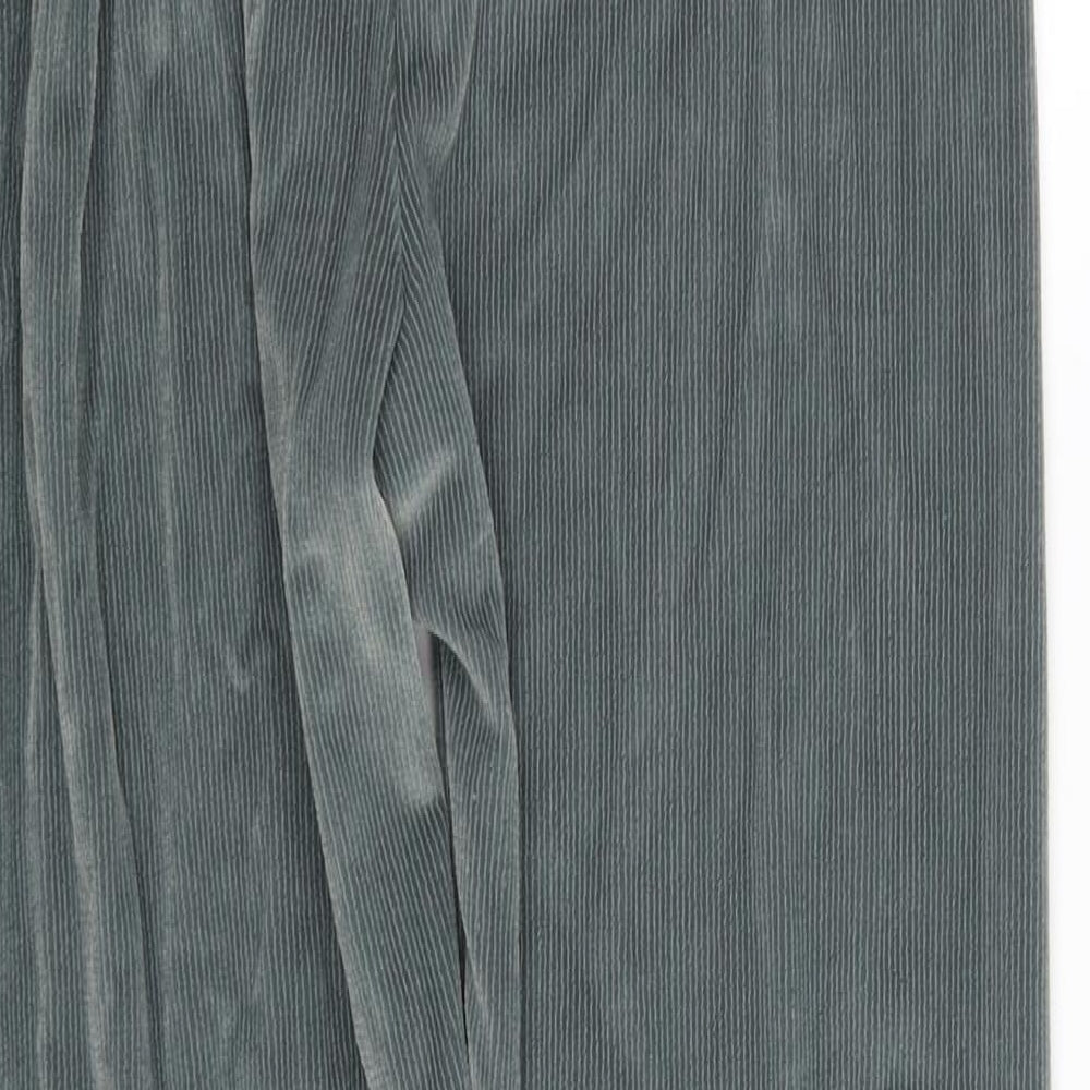 Brand and care label for Accent women’s green trousers, size M, 27-inch leg