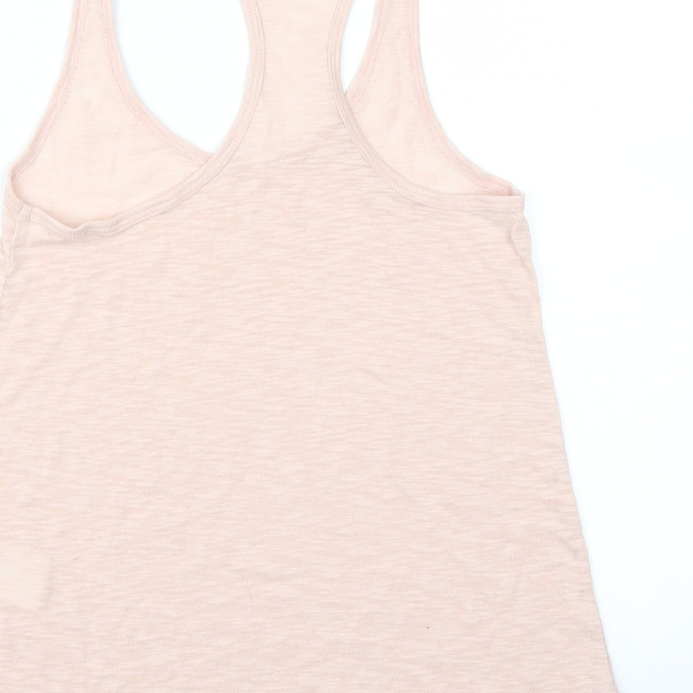 Brand and care label for H&M women’s pink basic t-shirt, size XS