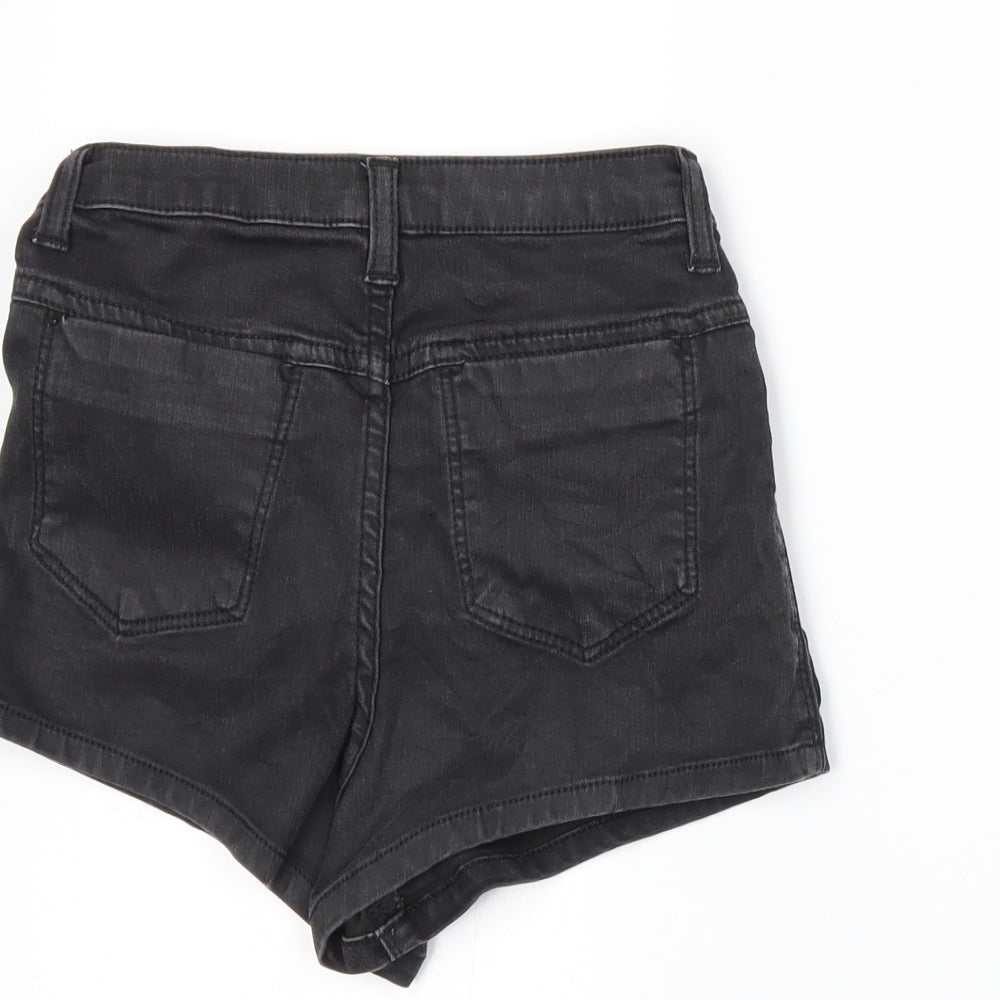 Brand and care label for Topshop women’s grey hot pants shorts, size UK 6