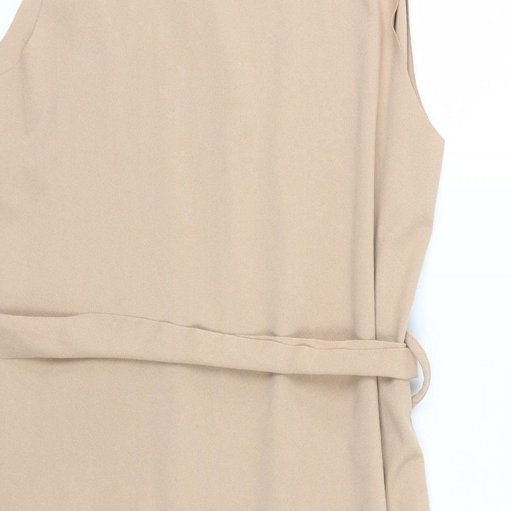 Brand and care label for Boohoo women’s beige jacket, size S