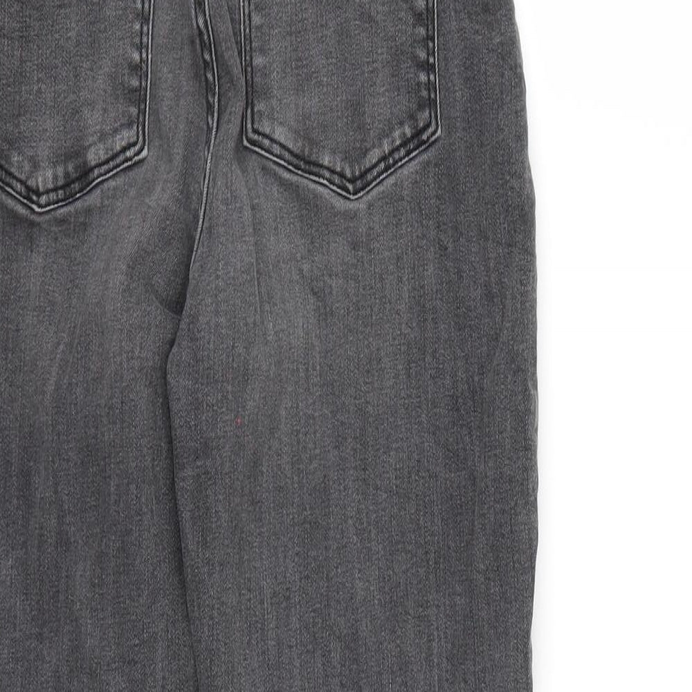 Brand and care label for H&M women’s black straight jeans, size UK 6, 25-inch leg