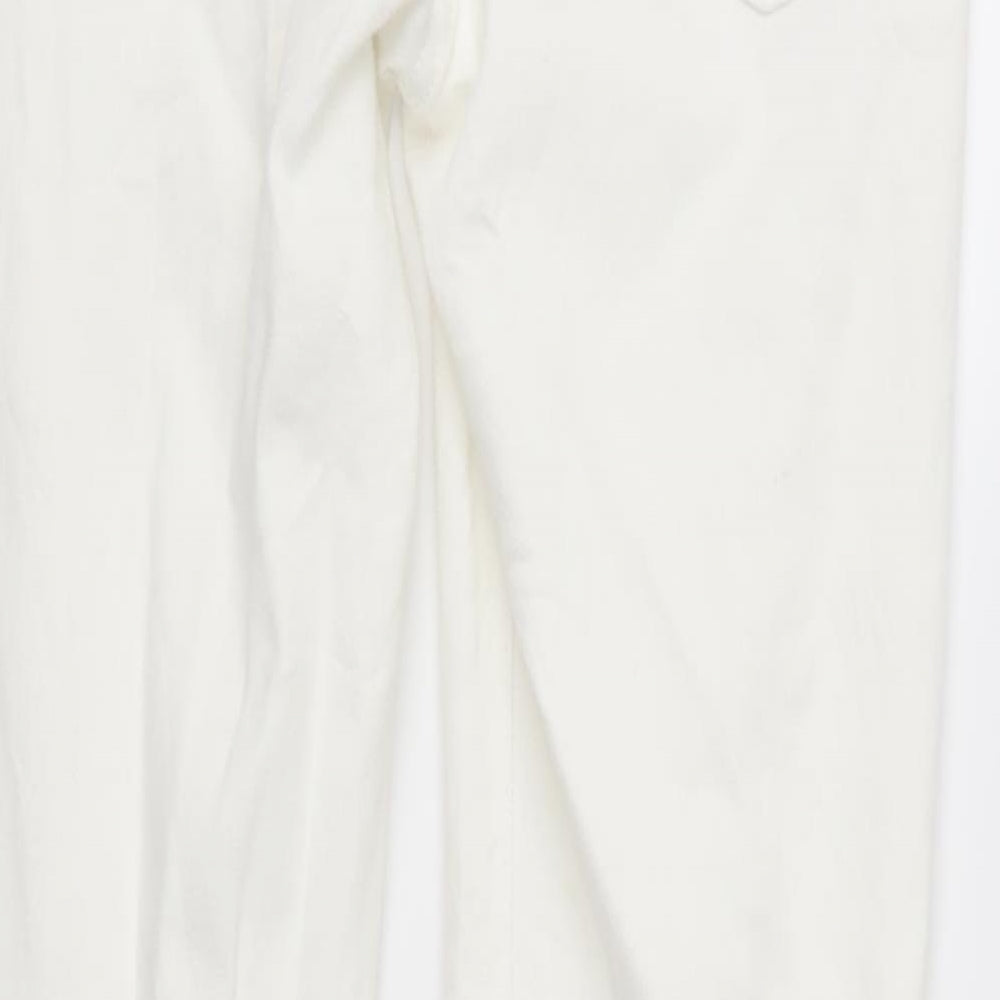 Brand and care label for Marks & Spencer women’s ivory denim skinny jeans, size UK 10, 28-inch leg