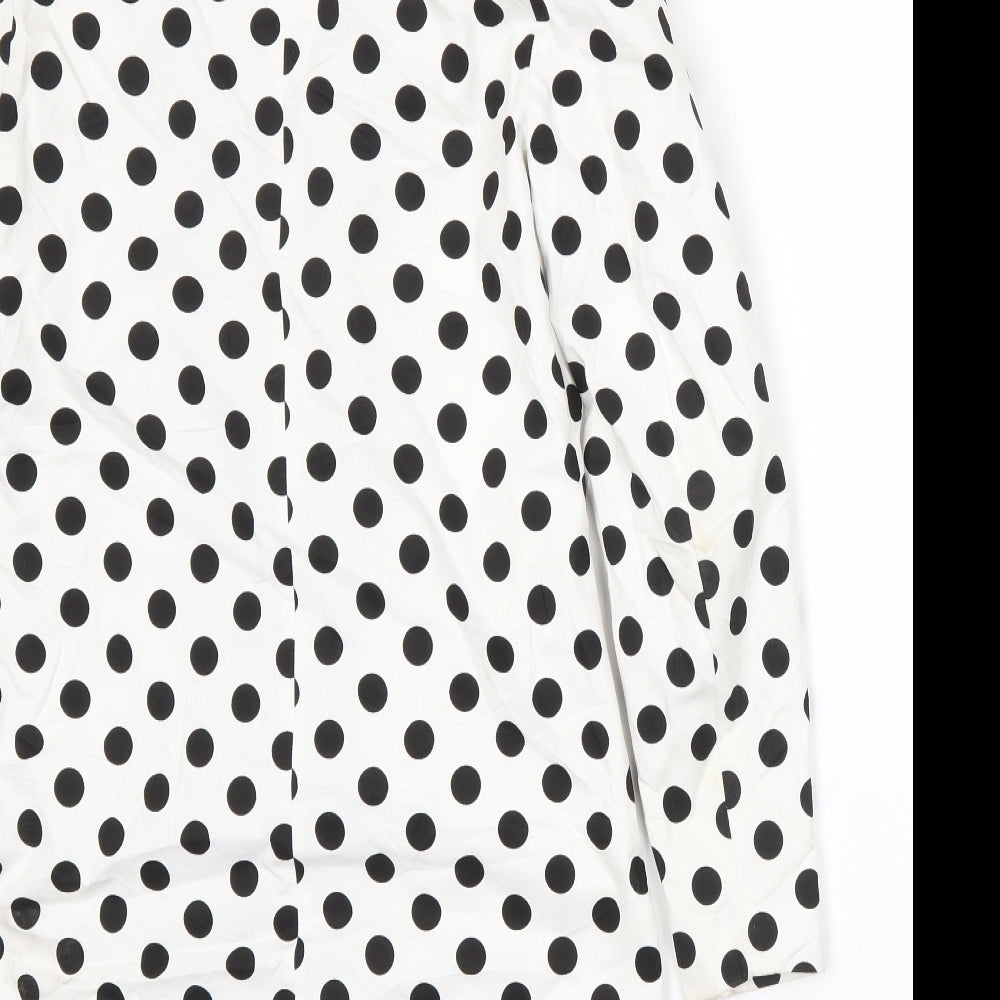 Brand and care label for Boohoo women’s white spotted jacket suit jacket, size UK 8