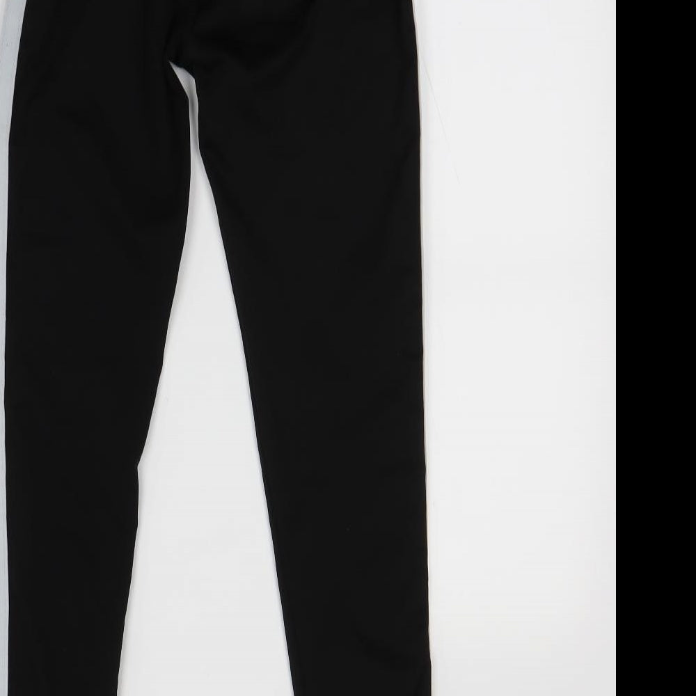 Brand and care label for Preworn girls’ black striped jegging trousers, size XL
