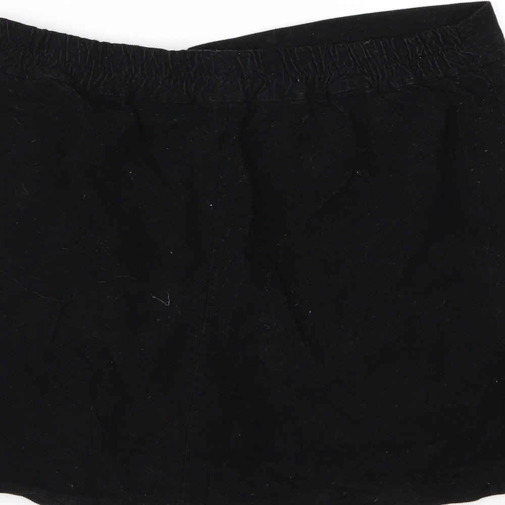 Brand and care label for Lulua women’s black corduroy a-line skirt, size L