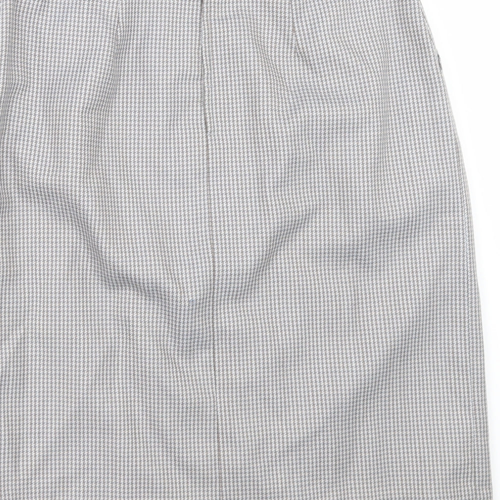 Brand and care label for Preworn women’s grey camouflage a-line skirt, size UK 30, in