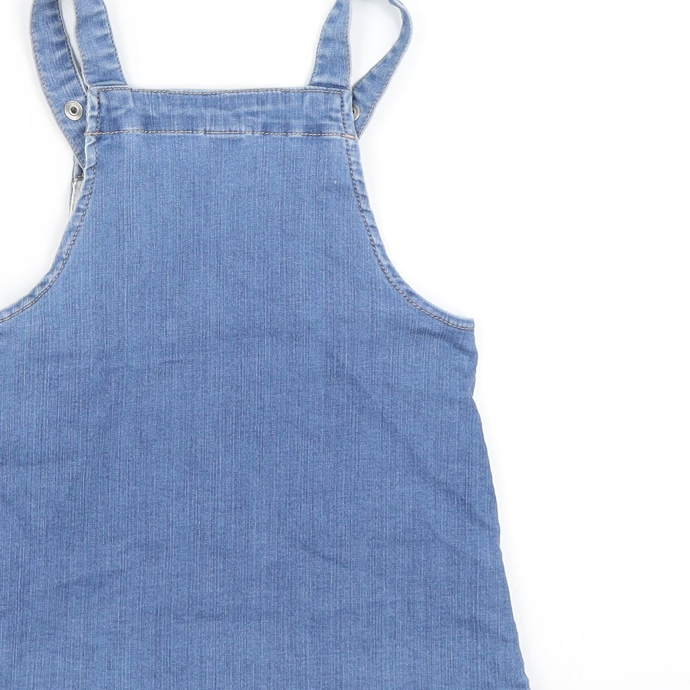 Brand and care label for H&M girls’ blue denim pinafore/dungaree dress, size 12, months