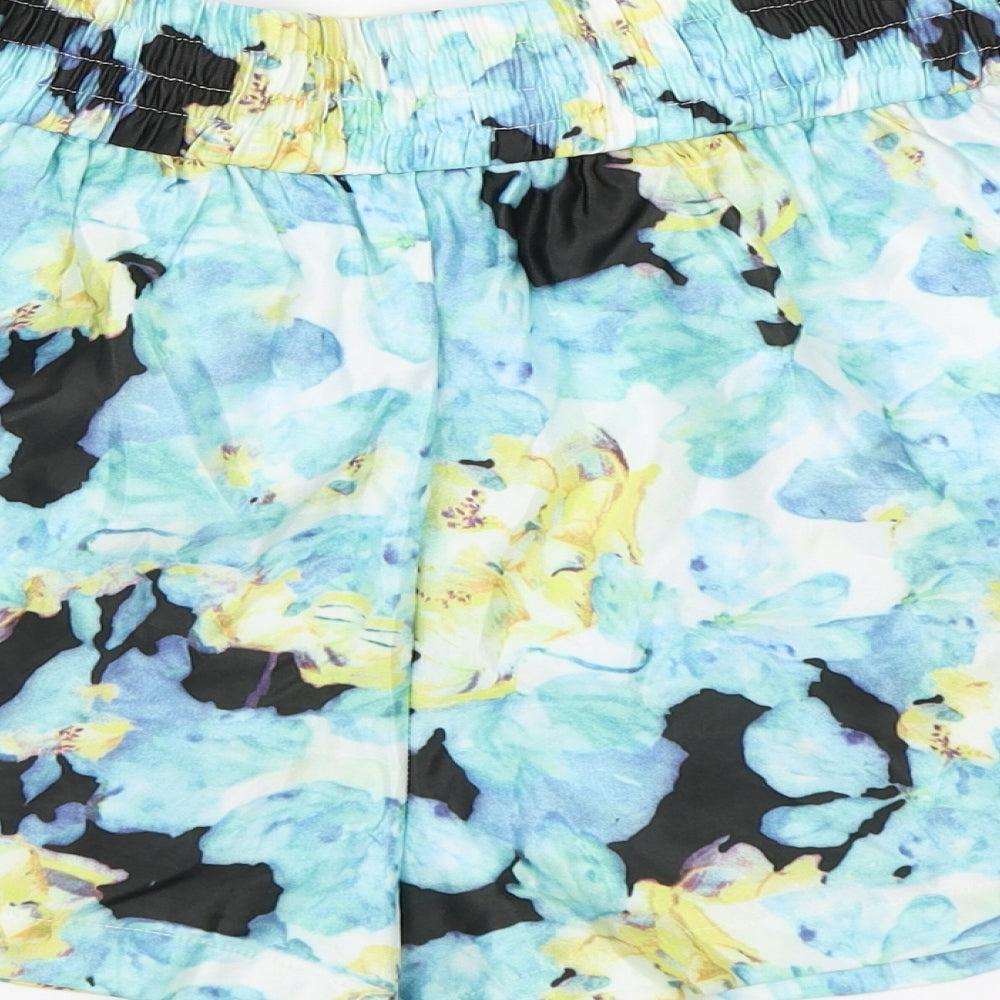 Brand and care label for Preworn women’s blue floral paperbag shorts, size L
