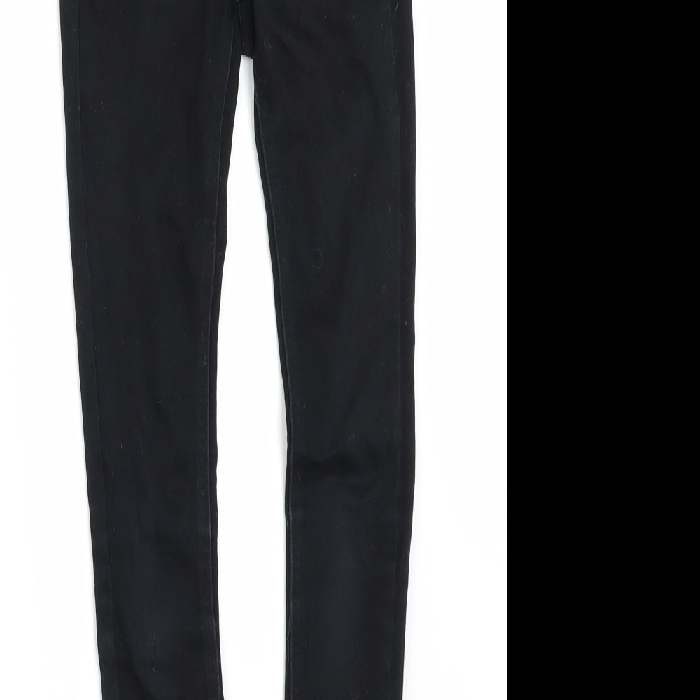 Brand and care label for New Look girls’ black denim skinny jeans, size 9, years