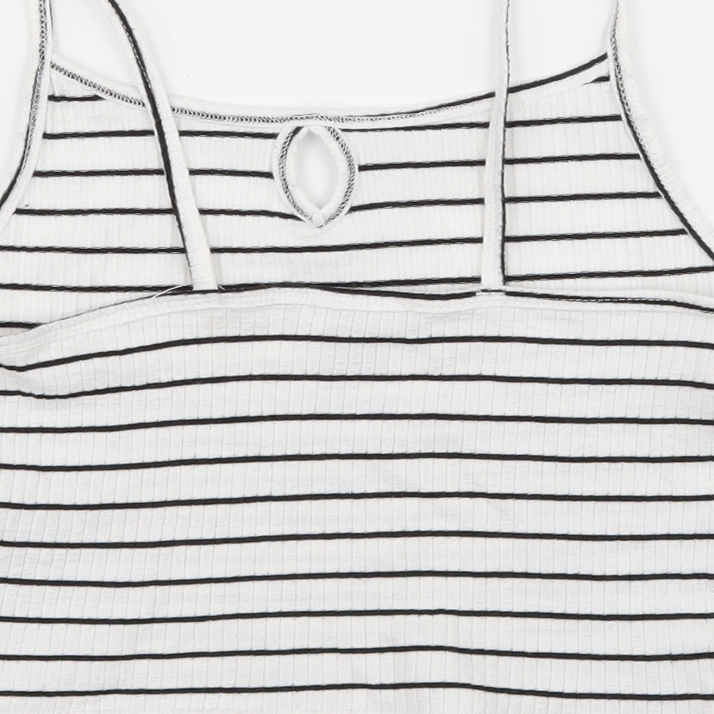 Brand and care label for Primark girls’ white striped jersey camisole tank, size 8, years
