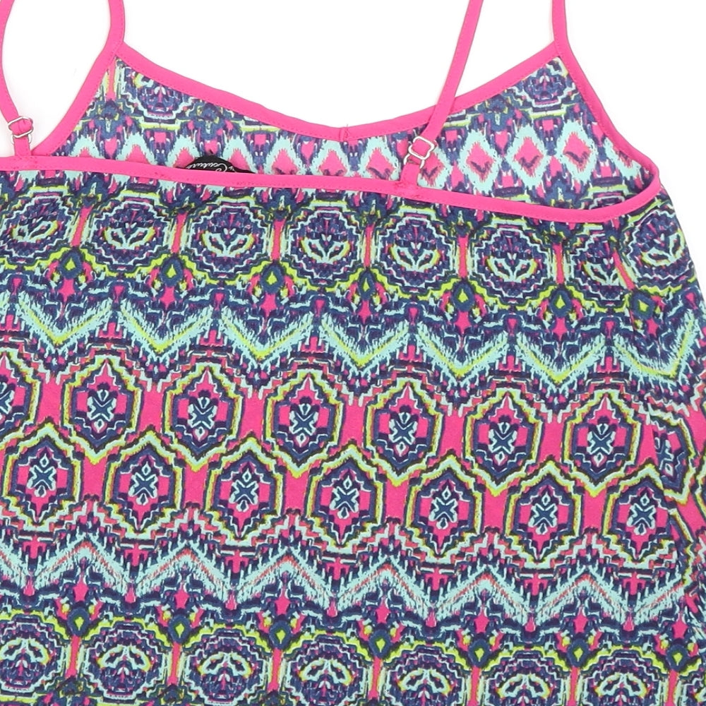 Brand and care label for Candy Couture girls’ blue geometric camisole blouse, size 12-13, years