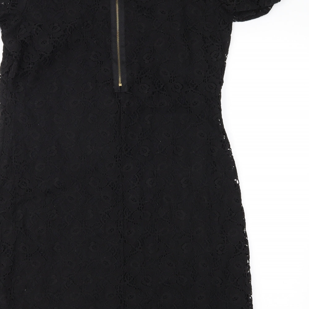 Brand and care label for Evie women’s black lace shift, size UK 14