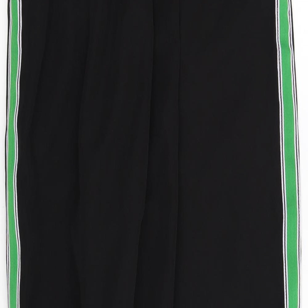 Brand and care label for Boohoo women’s black trousers, size UK 12, 27-inch leg