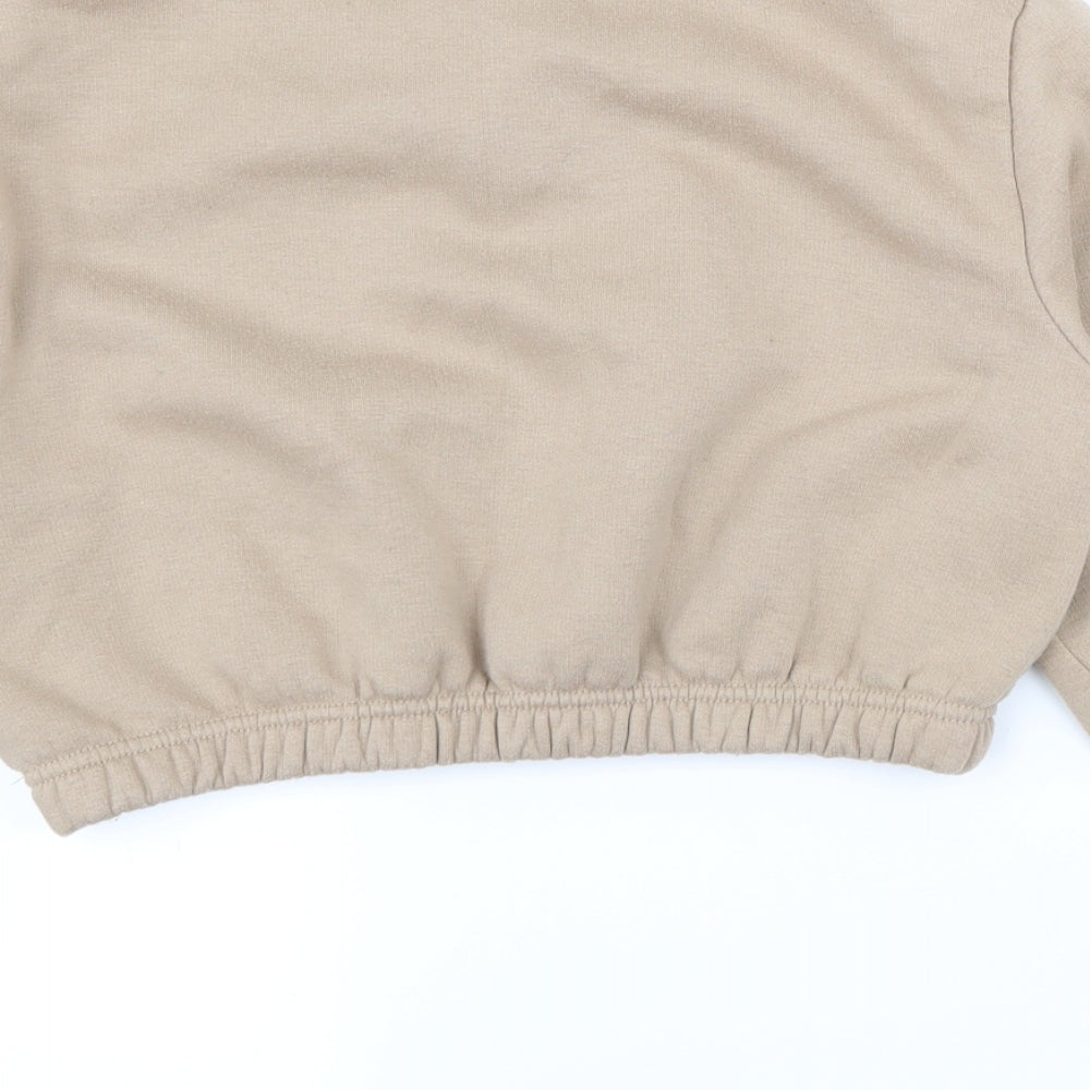 Brand and care label for Boohoo women’s beige jumper, size UK 8