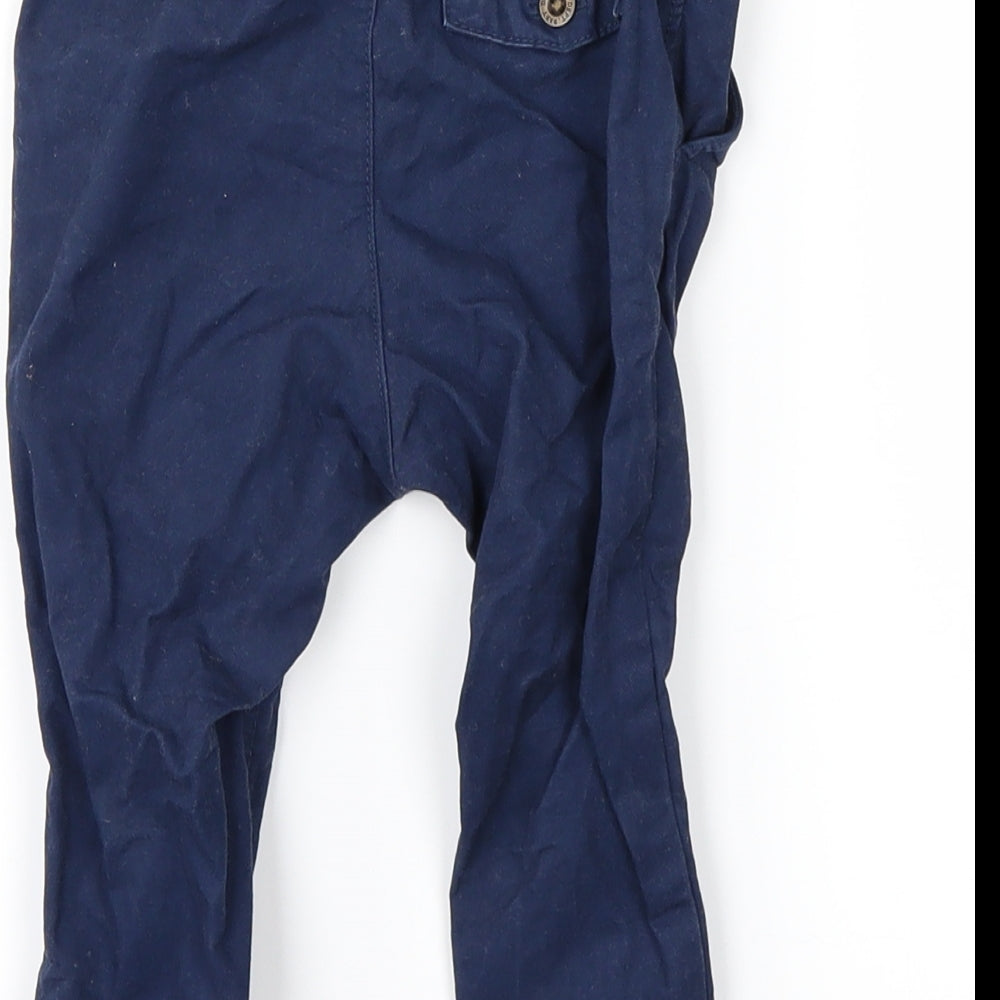 Brand and care label for H&M Baby Blue Cargo Jeans, size 6-9, Months