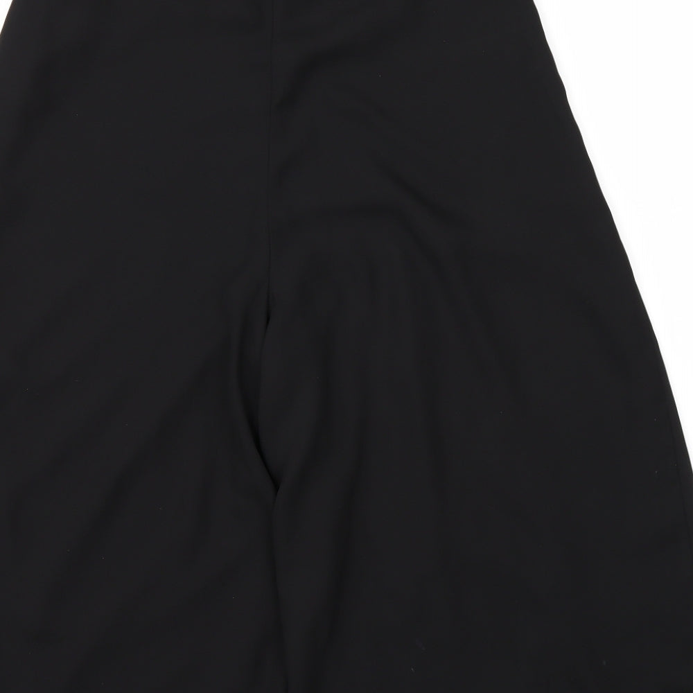 Brand and care label for Miss Selfridge women’s black trousers, size UK 8, 20-inch leg