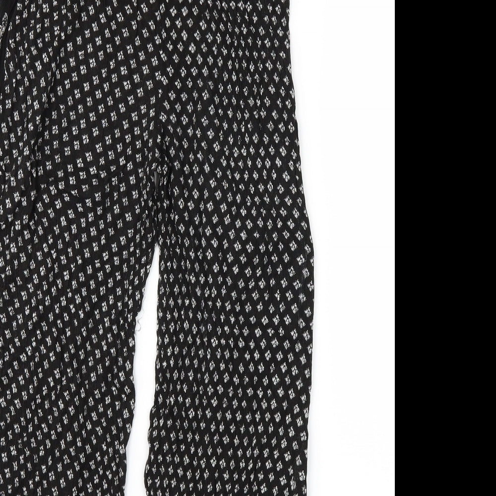 Brand and care label for akas women’s black trousers, size UK 10, 20-inch leg