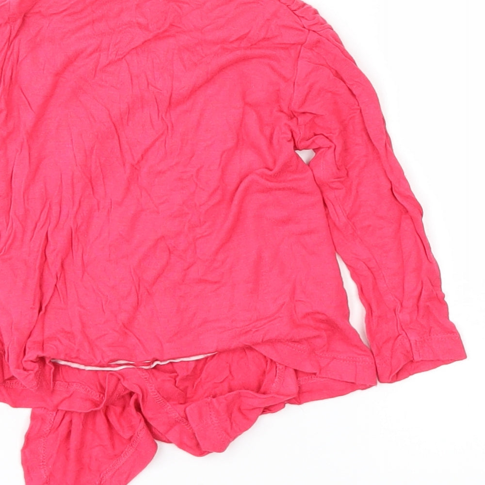 Brand and care label for Preworn girls’ pink jumper, size 18-24, months