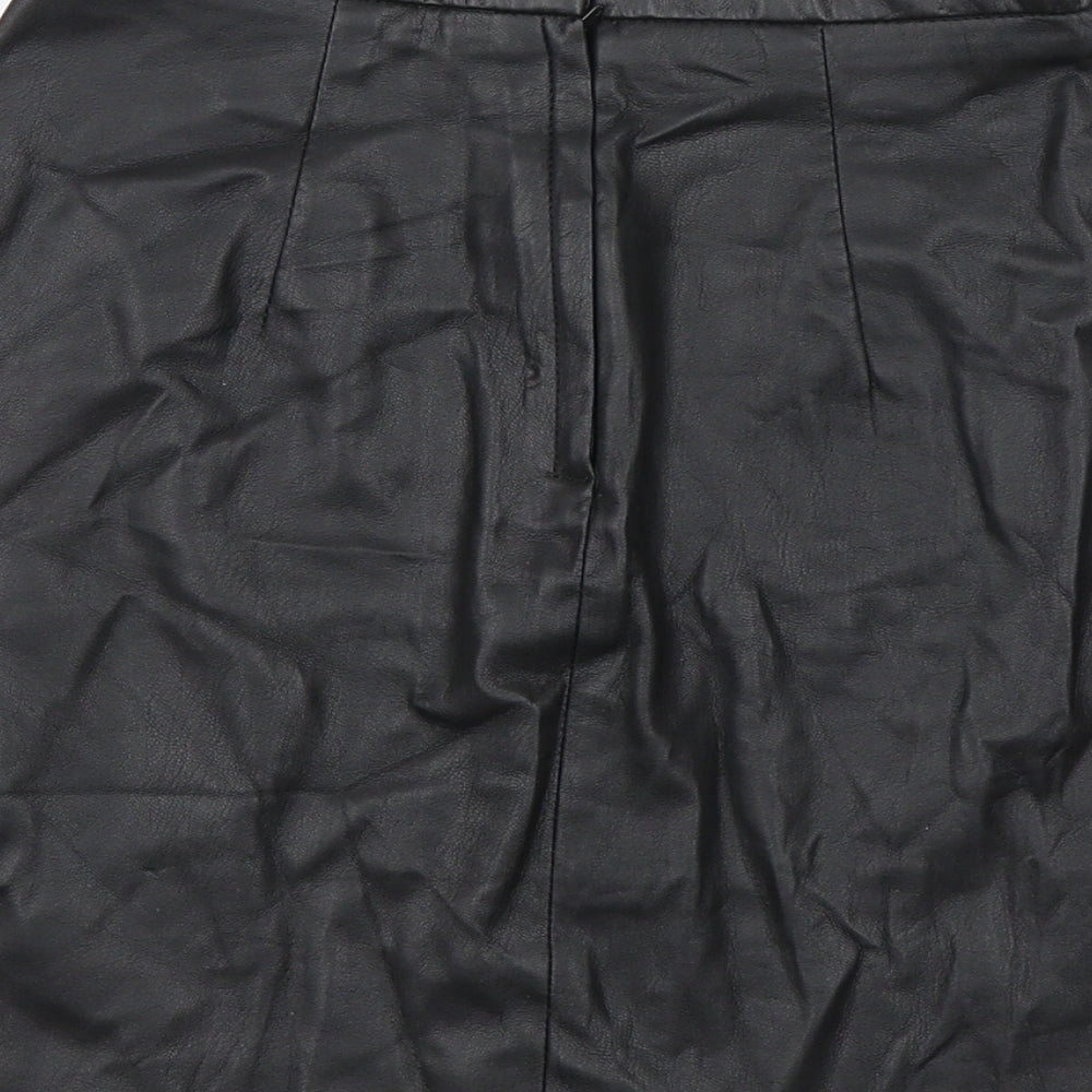 Brand and care label for H&M women’s black pleated skirt, size UK 6, - faux leather