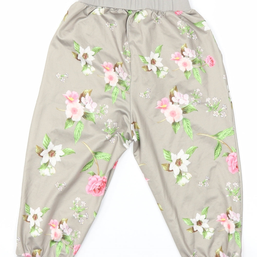 Brand and care label for Preworn girls’ grey floral harem trousers, size 8, years