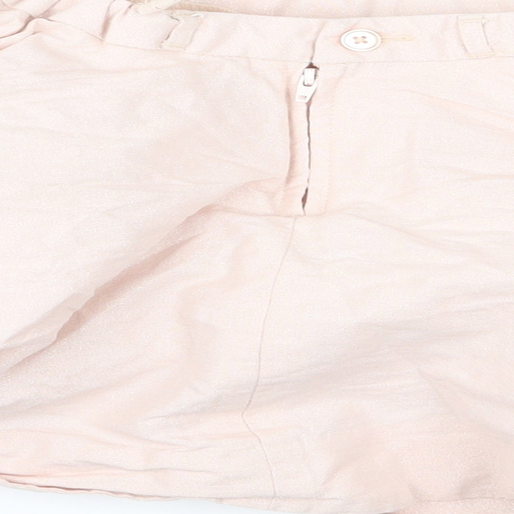 Brand and care label for Matalan girls’ pink flare skirt, size 6-7, years