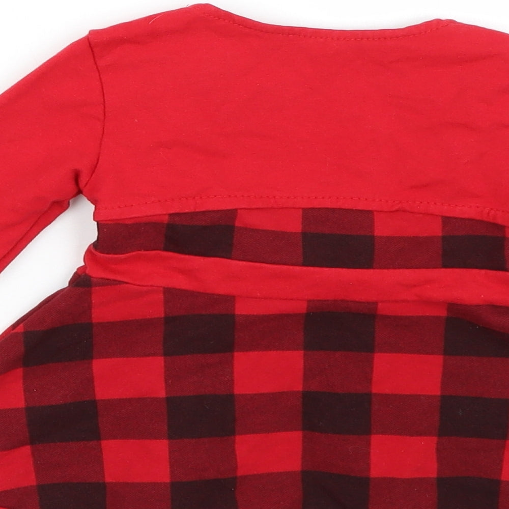 Brand and care label for Preworn girls’ red check a-line, size 12, months