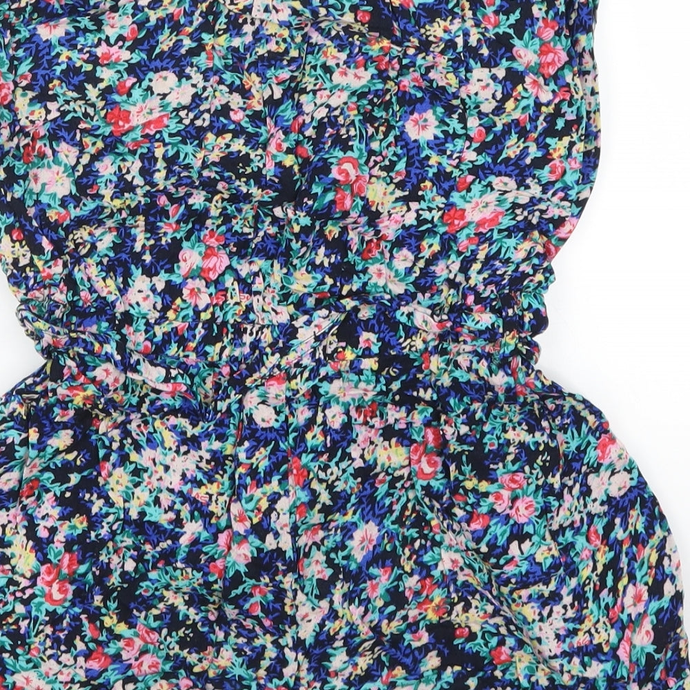 Brand and care label for Paris women’s blue floral playsuit one-piece, size S