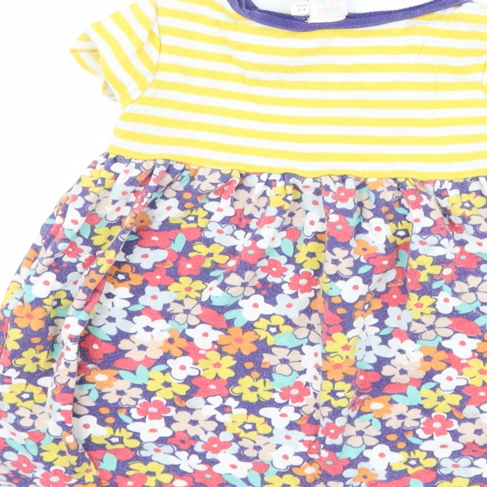 Brand and care label for Boots Mini Club girls’ blue floral t-shirt dress, size 6-9, months